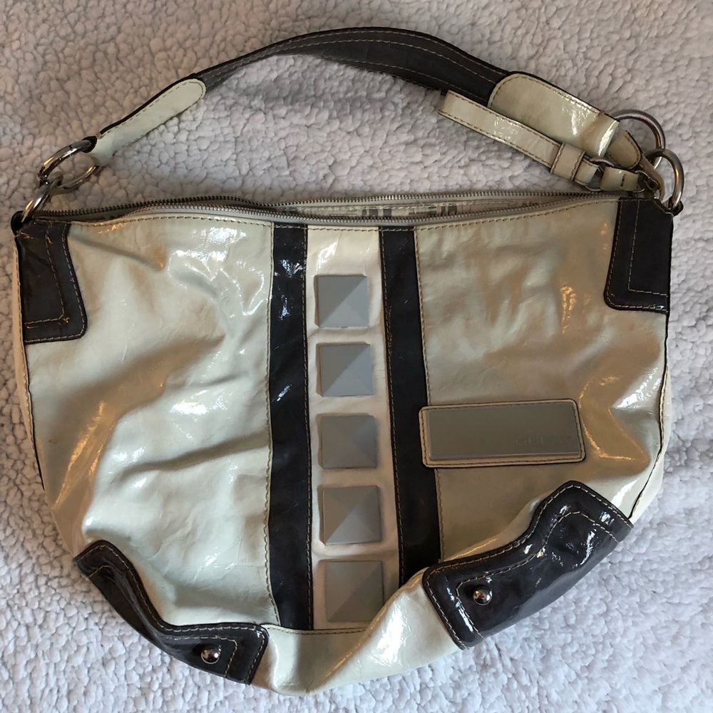 Gently used ivory and gray Guess shoulder hobo bag